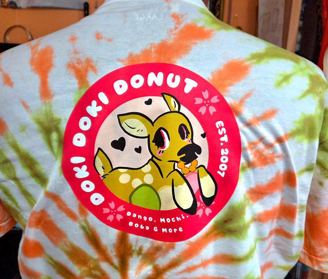 "Doki Doki Donut" BACK. Original Design for a self-created fictional shop. example in size XL. low immersion tie-dye in-house; self-designed DTF outsourced for print and aplied in-house.